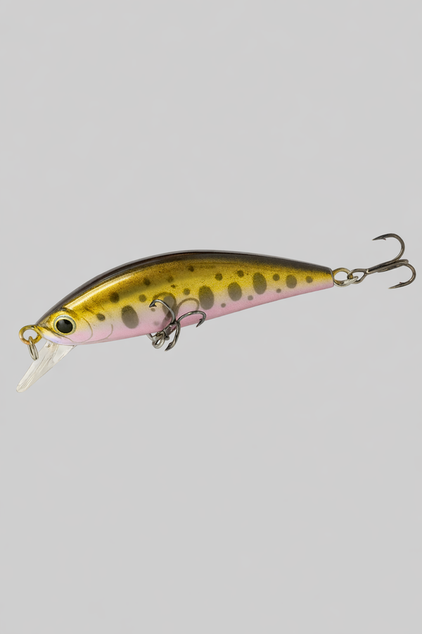 Fishing lure with a spotted pattern on a gray background