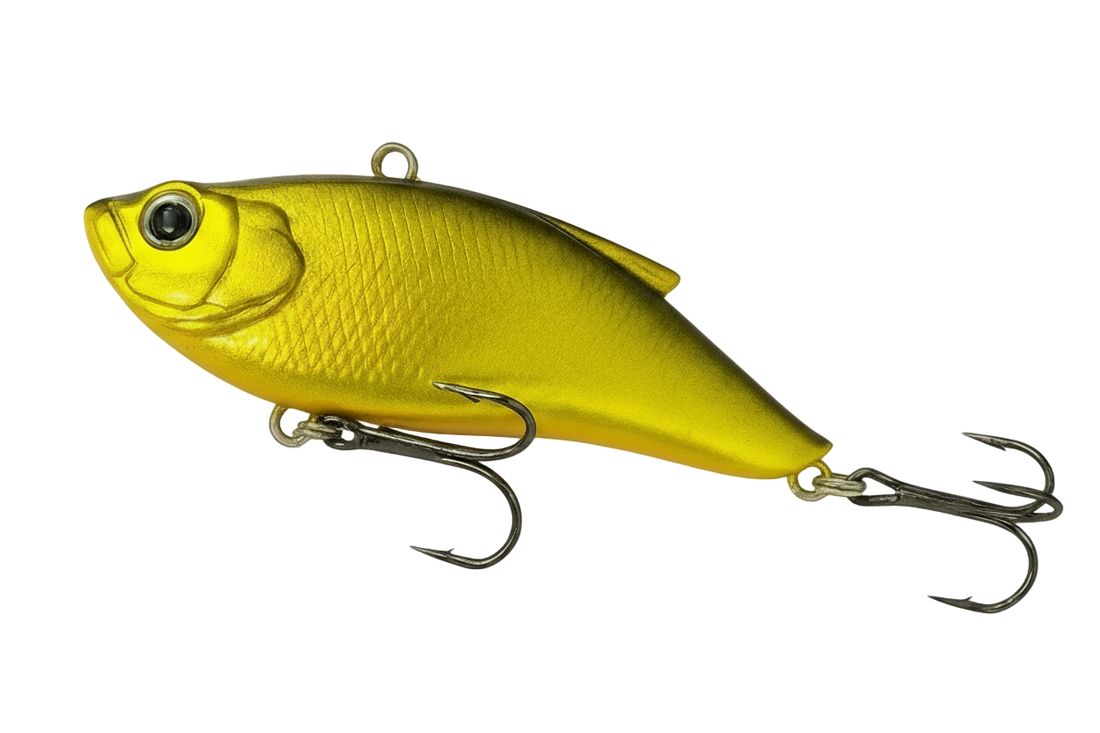 Yellow fishing lure with a hook on a white background