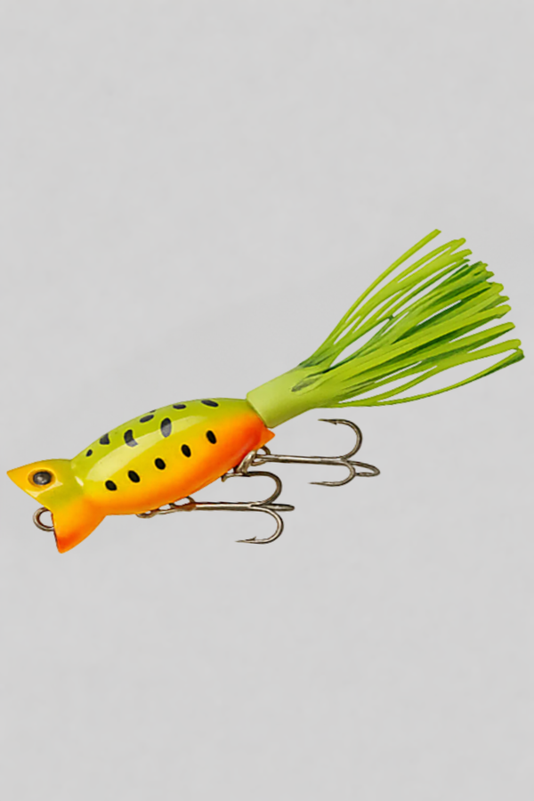Fishing lure with orange and green body on a light gray background