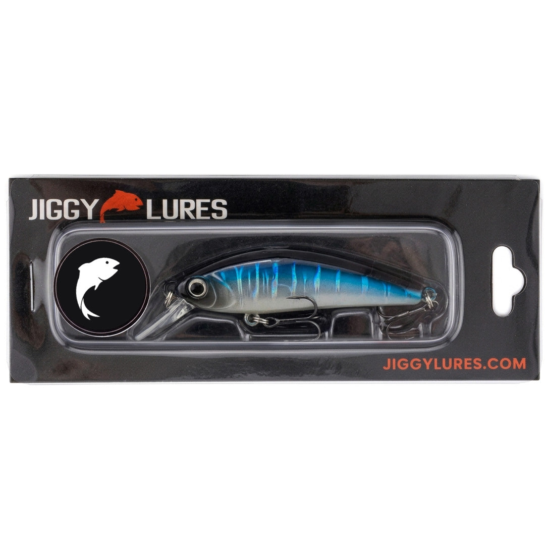 Blue and black fishing lure on a white background